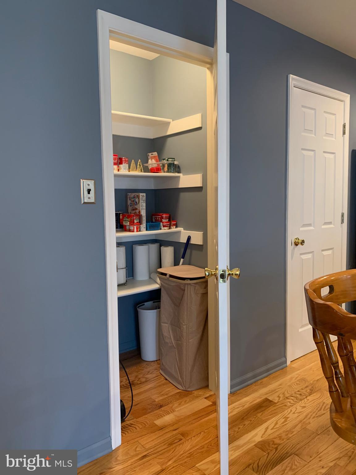 78 Baltusrol Drive Charles Town, WV 25414 - Photo 20 of 26 a view of a livingroom with table and kitchen