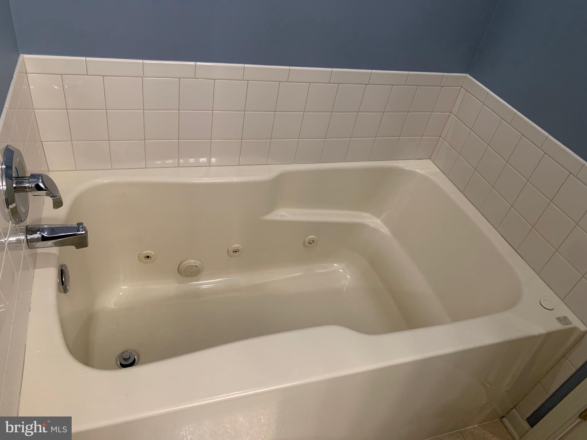 78 Baltusrol Drive Charles Town, WV 25414 - Photo 22 of 26 a view of a bathtub in a bathroom