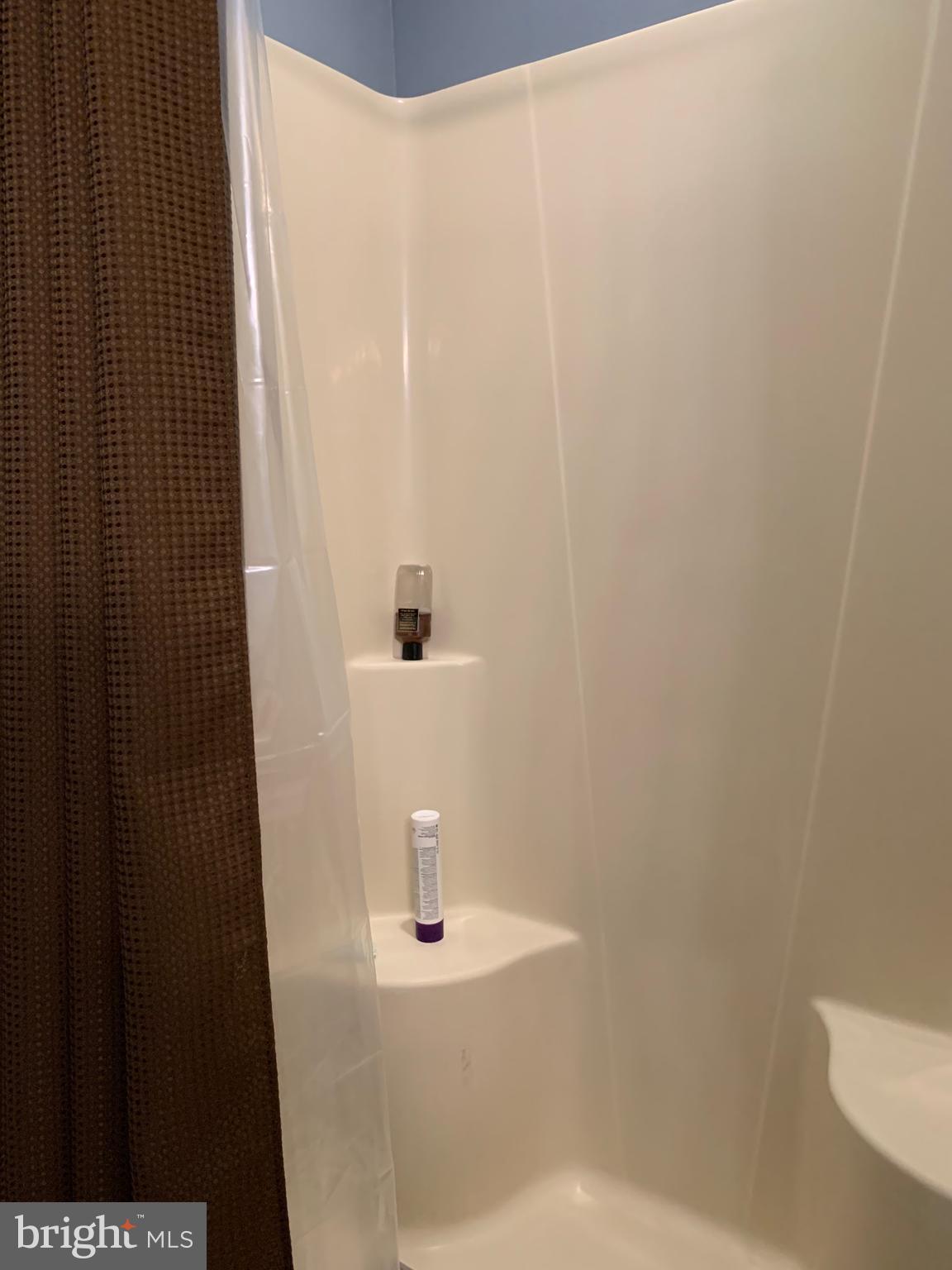 78 Baltusrol Drive Charles Town, WV 25414 - Photo 23 of 26 a close up of a shower curtain