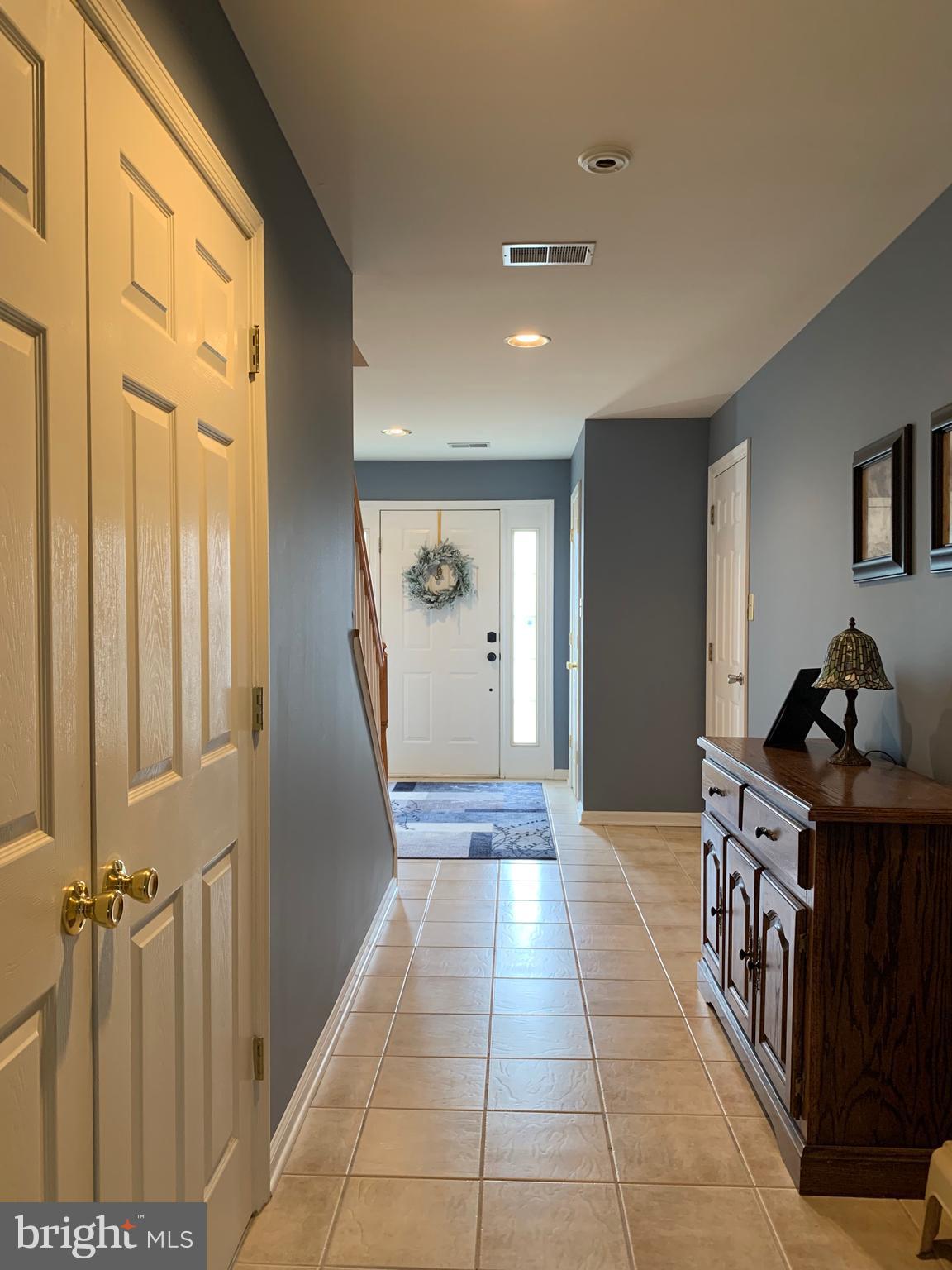 78 Baltusrol Drive Charles Town, WV 25414 - Photo 26 of 26 a hallway with dining area closet and livingroom view