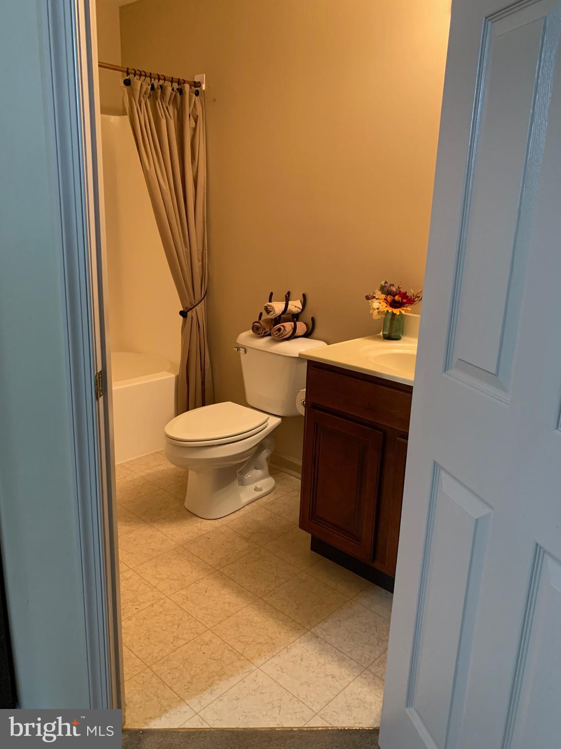 78 Baltusrol Drive Charles Town, WV 25414 - Photo 9 of 26 a bathroom with a sink and a toilet