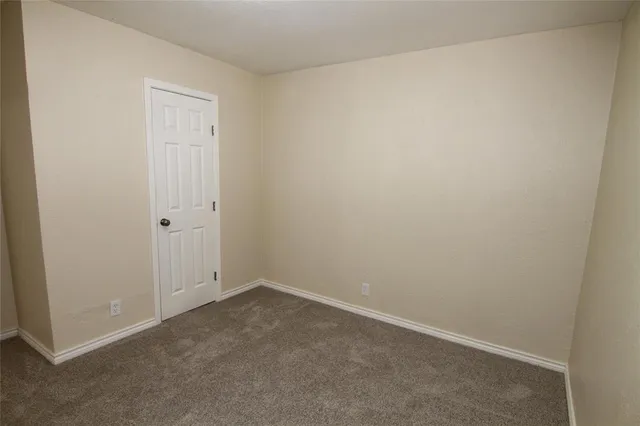 an empty room with an entryway