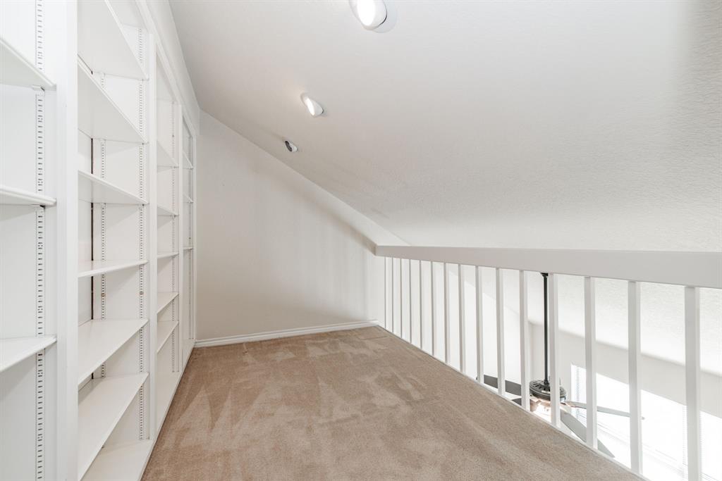 1106 Signal Ridge Place Rockwall, TX 75032 - Photo 25 of 32 a view of a hallway with staircase