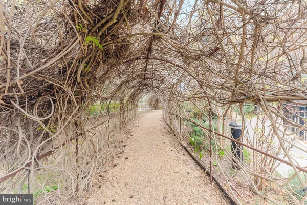 a front view of a building with outdoor space