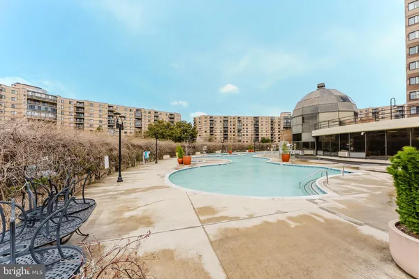a view of a balcony with wooden floor