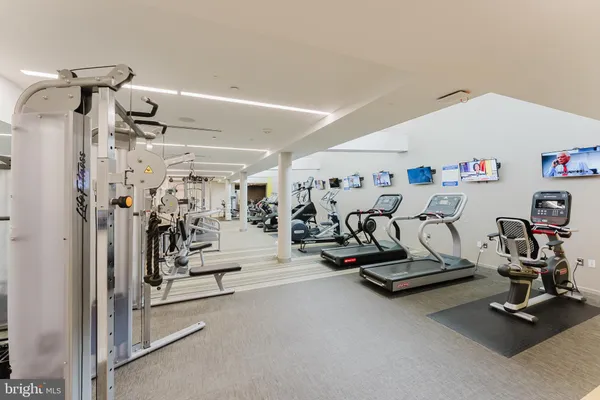 a lobby with furniture and outdoor view