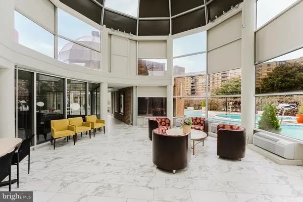 a view of a park with swings and slides