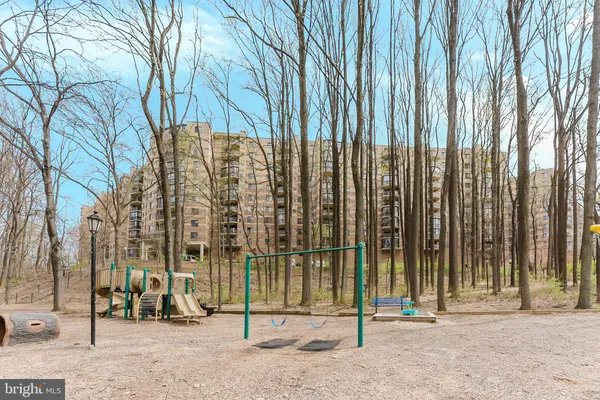 an front view of house with yard and seating area