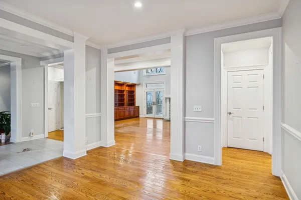 a kitchen with stainless steel appliances granite countertop a sink and a refrigerator