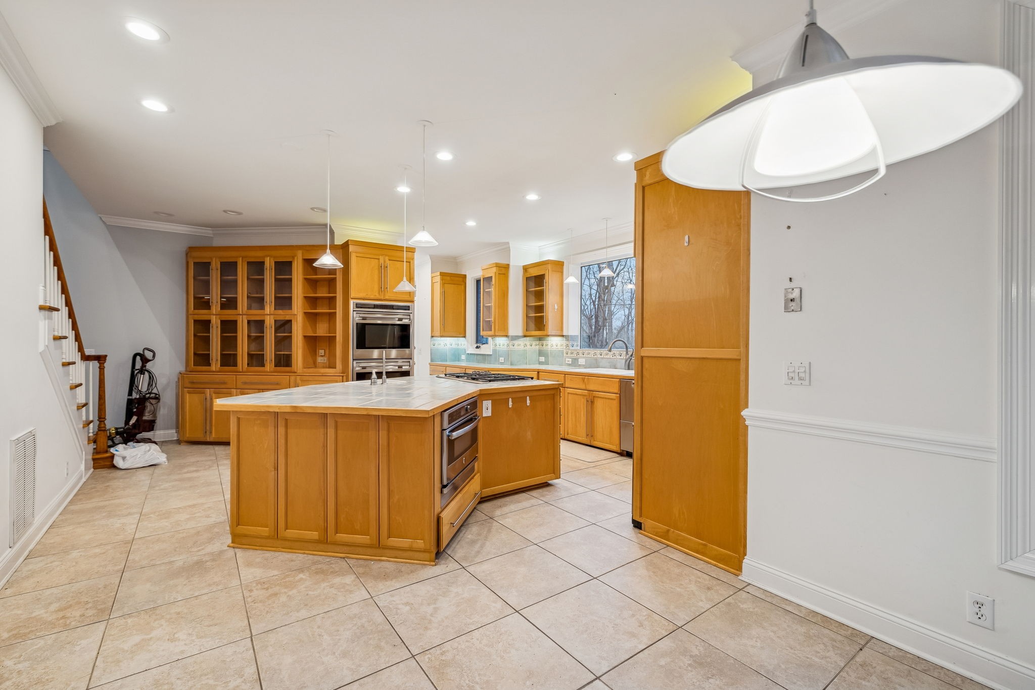 1010 Street Road Kingston Springs, TN 37082 - Photo 20 of 94 a kitchen with a refrigerator and a sink