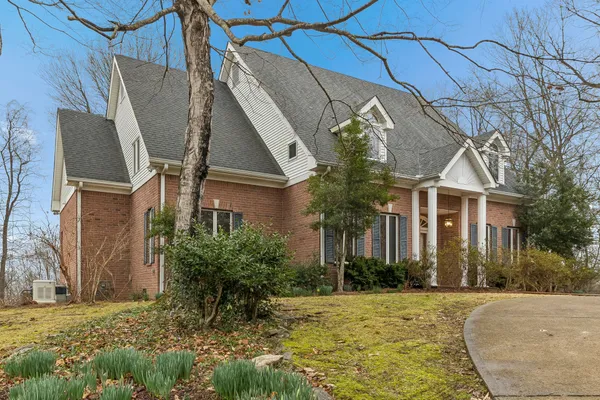 a view of a pathway with a bench