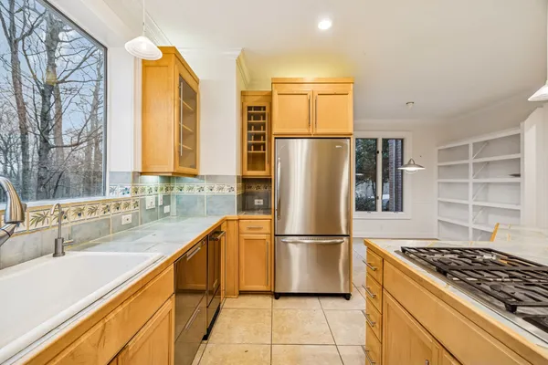 a view of an empty room with cabinet