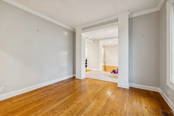 a view of an empty room with a window