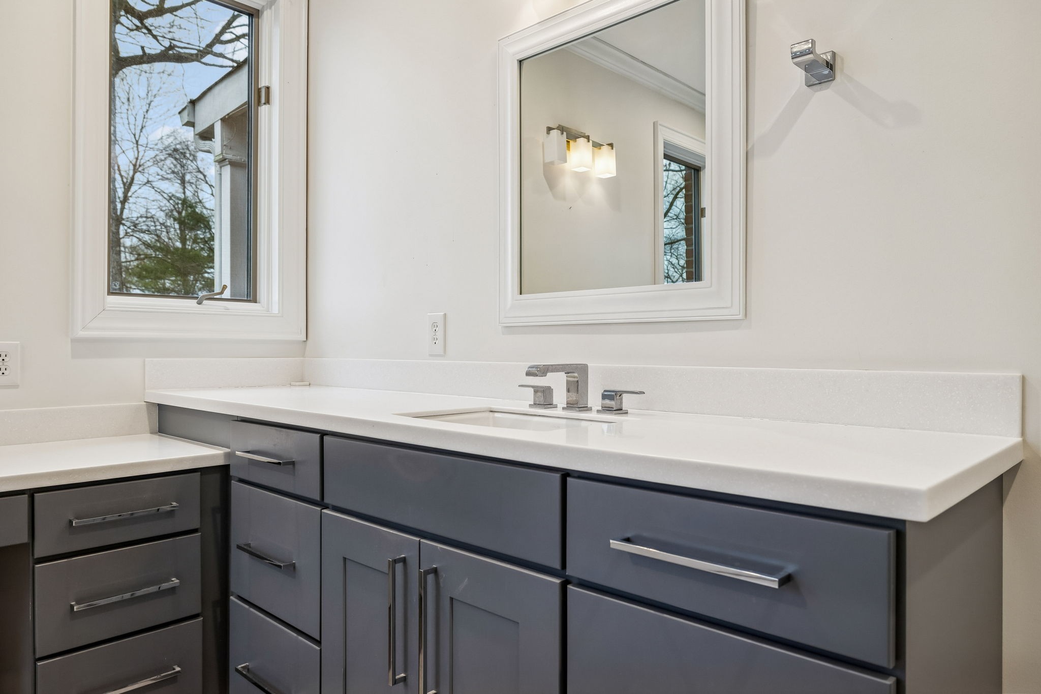 1010 Street Road Kingston Springs, TN 37082 - Photo 39 of 98 a bathroom with a sink and two mirror