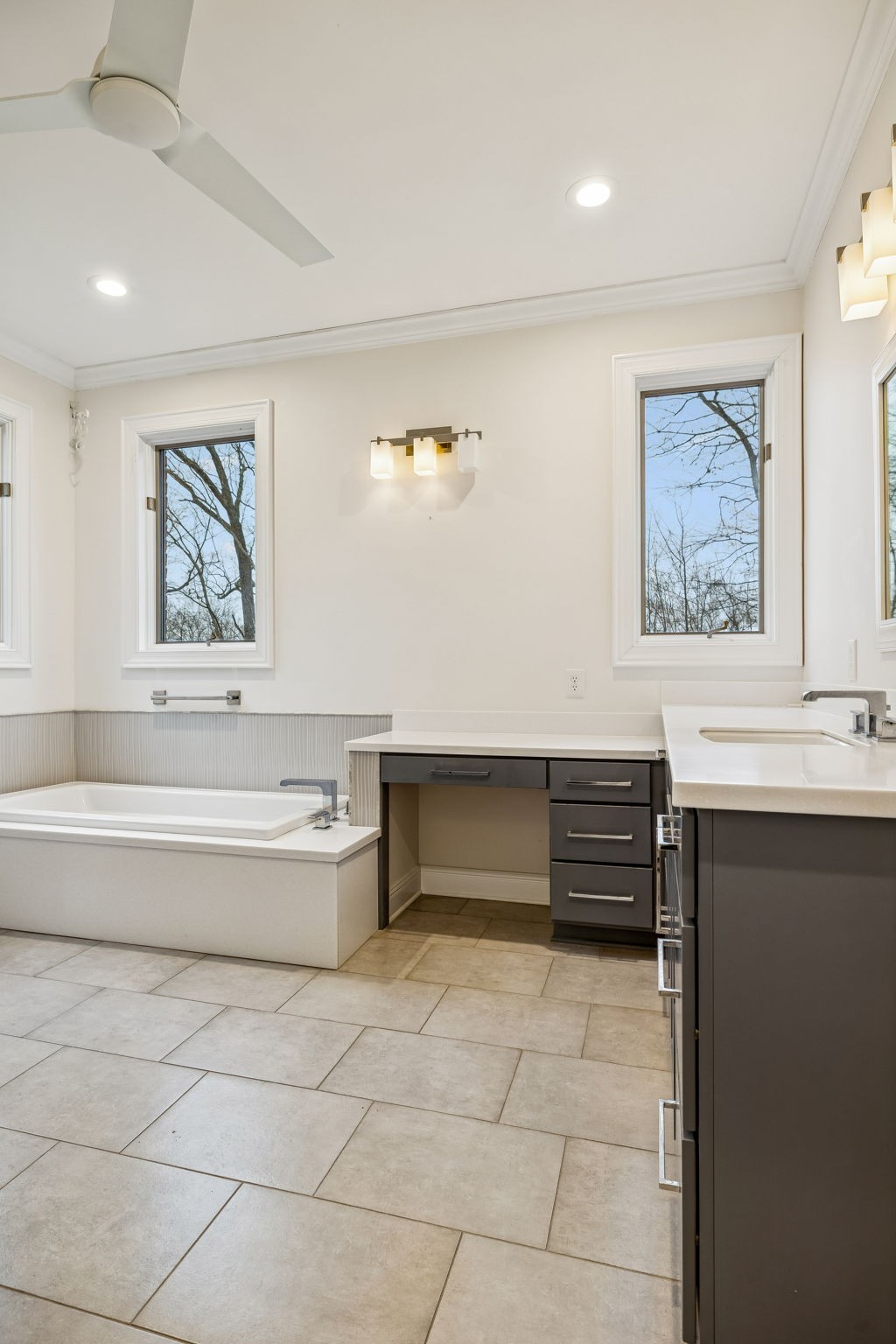 1010 Street Road Kingston Springs, TN 37082 - Photo 39 of 94 a spacious bathroom with a bathtub and a sink