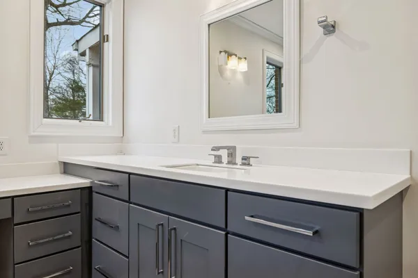 a view of a room with wooden walls