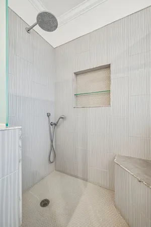 a view of a balcony with wooden floor