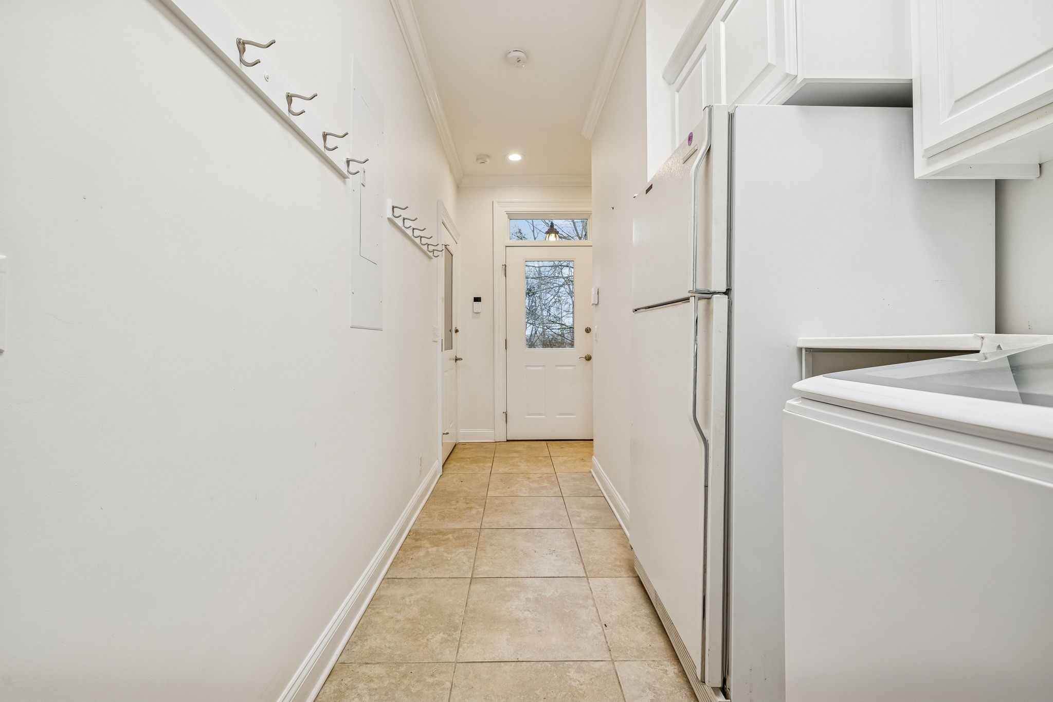 1010 Street Road Kingston Springs, TN 37082 - Photo 47 of 98 a view of a hallway with white walls and entryway