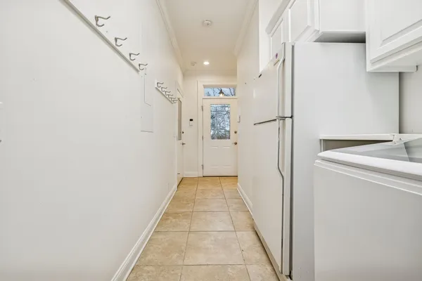 a view of a wooden deck with a yard