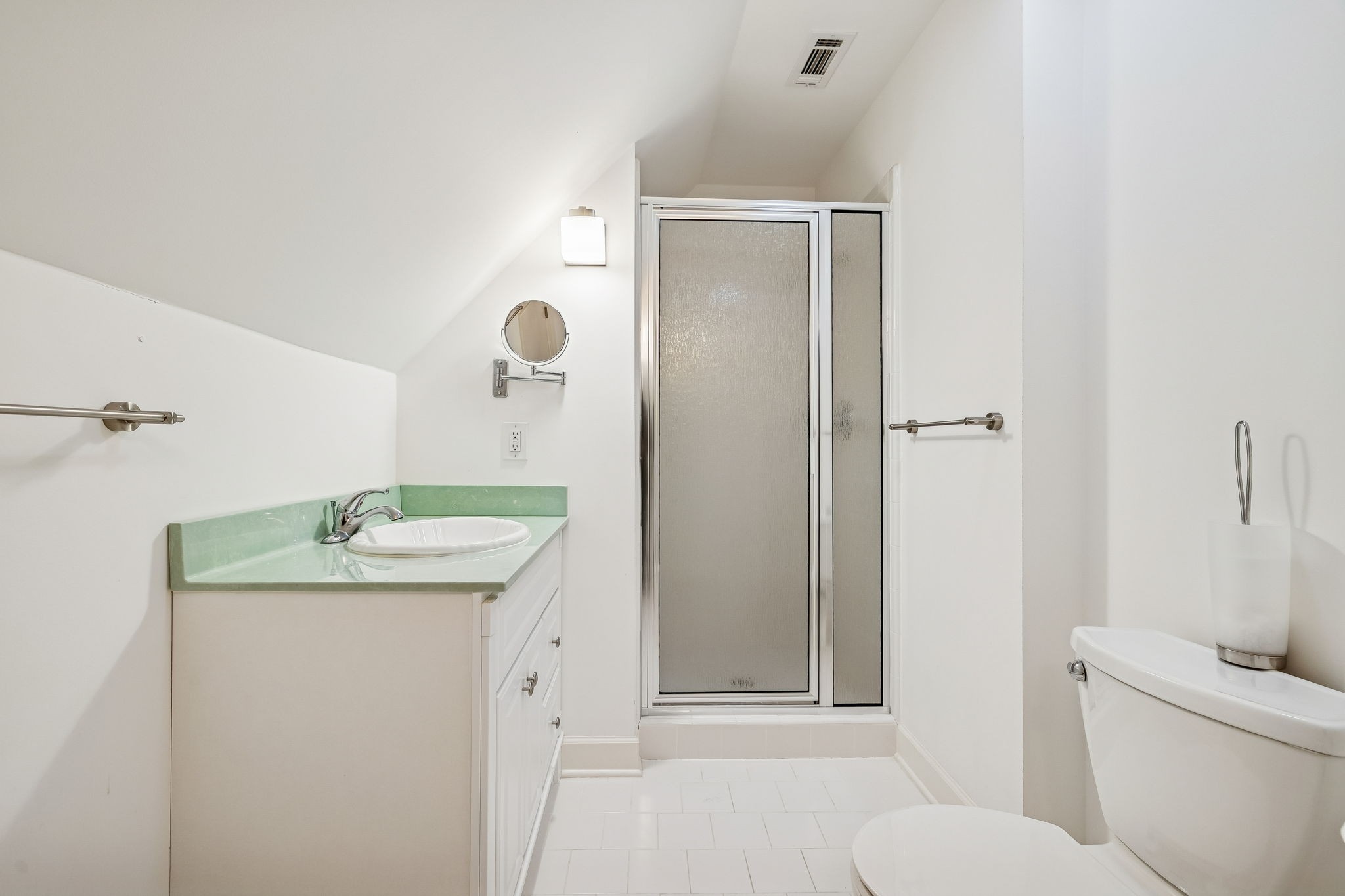1010 Street Road Kingston Springs, TN 37082 - Photo 55 of 94 a bathroom with a granite countertop sink a toilet and shower