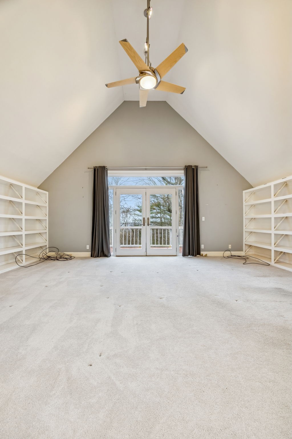 1010 Street Road Kingston Springs, TN 37082 - Photo 66 of 94 an empty room with a ceiling fan and window