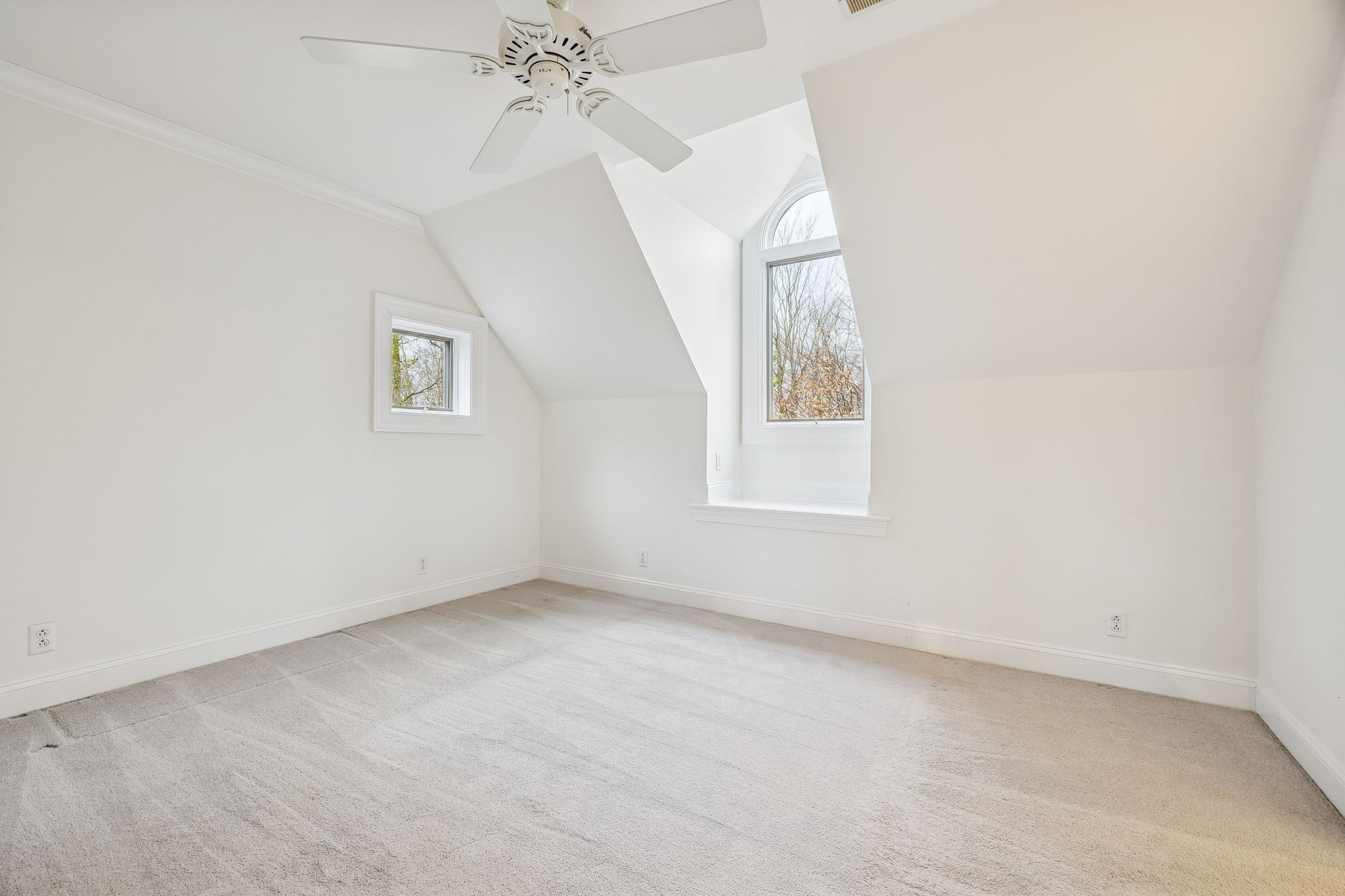 1010 Street Road Kingston Springs, TN 37082 - Photo 69 of 98 an empty room with windows and fan