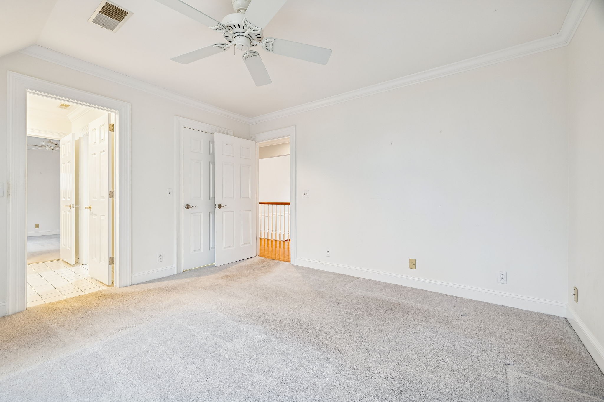1010 Street Road Kingston Springs, TN 37082 - Photo 71 of 94 an empty room with closet and a chandelier fan