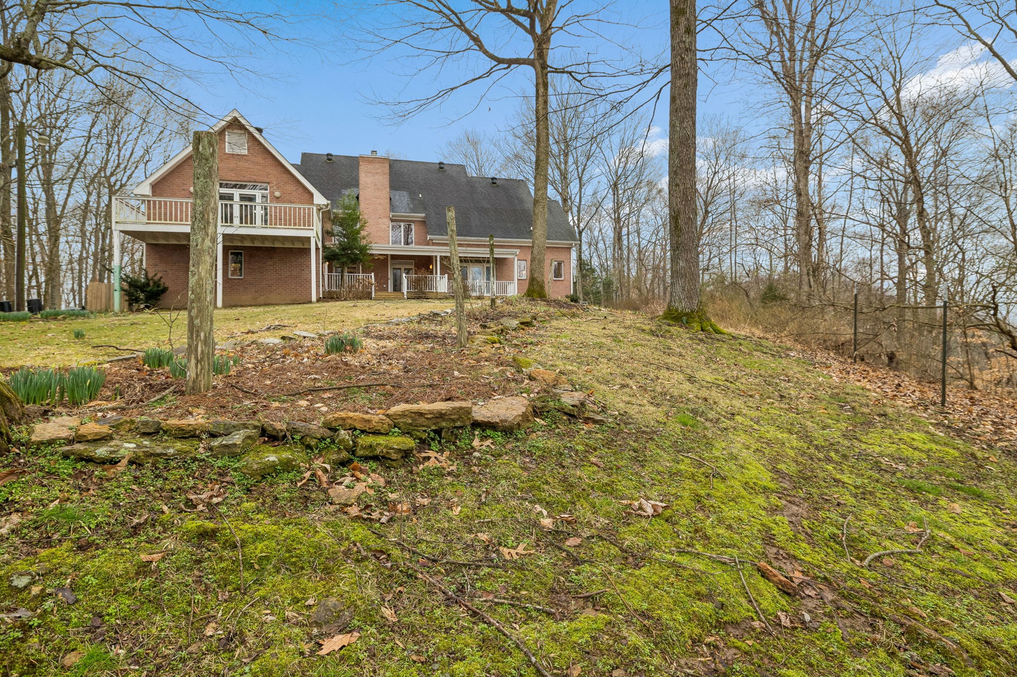1010 Street Road Kingston Springs, TN 37082 - Photo 82 of 94 a front view of a house with a garden