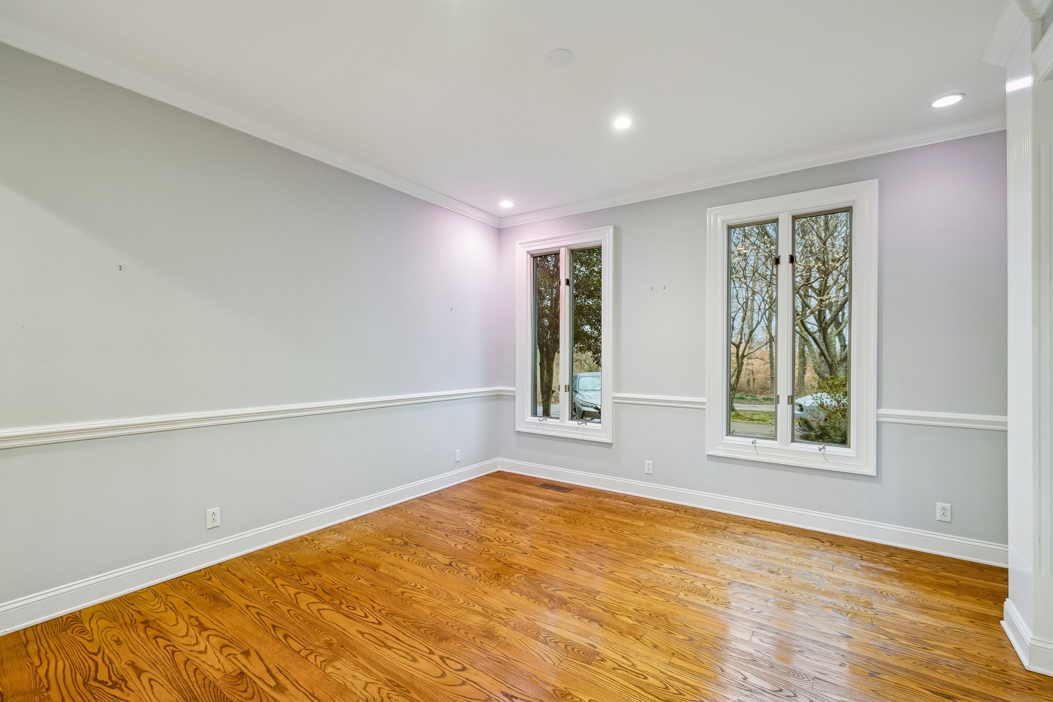 1010 Street Road Kingston Springs, TN 37082 - Photo 10 of 94 a view of an empty room with wooden floor and a window
