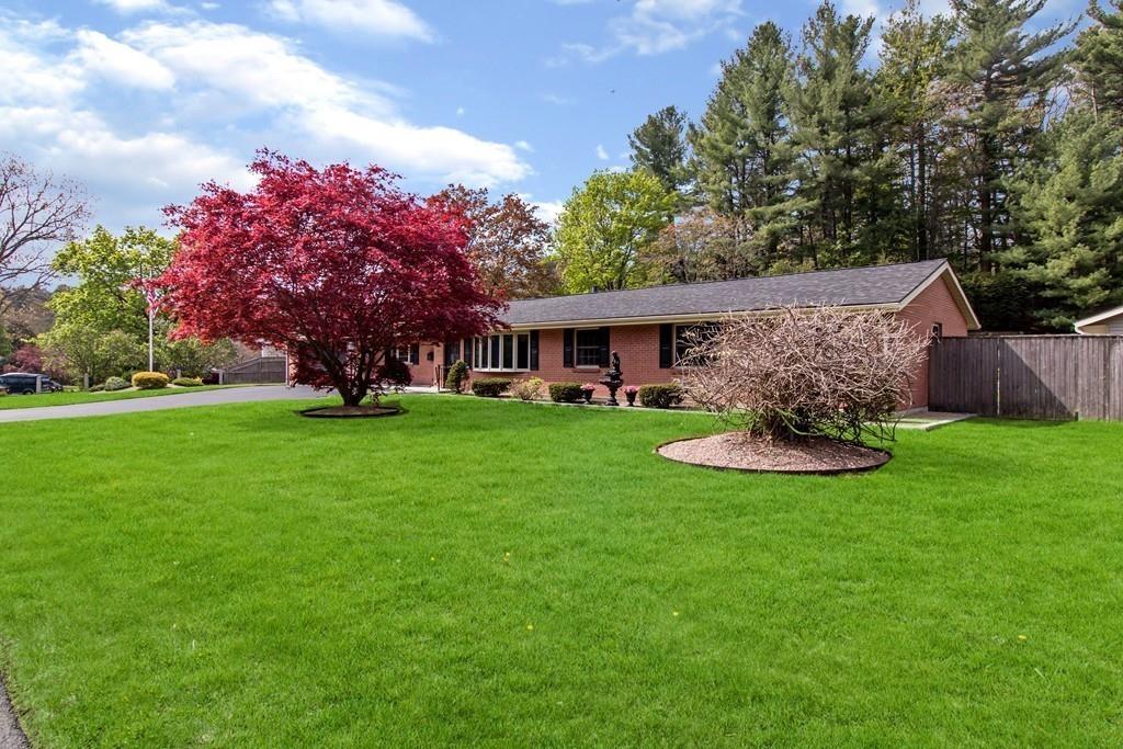 17 Janet Road Chelmsford, MA 01824 - Photo 3 of 28 a front view of a house with garden