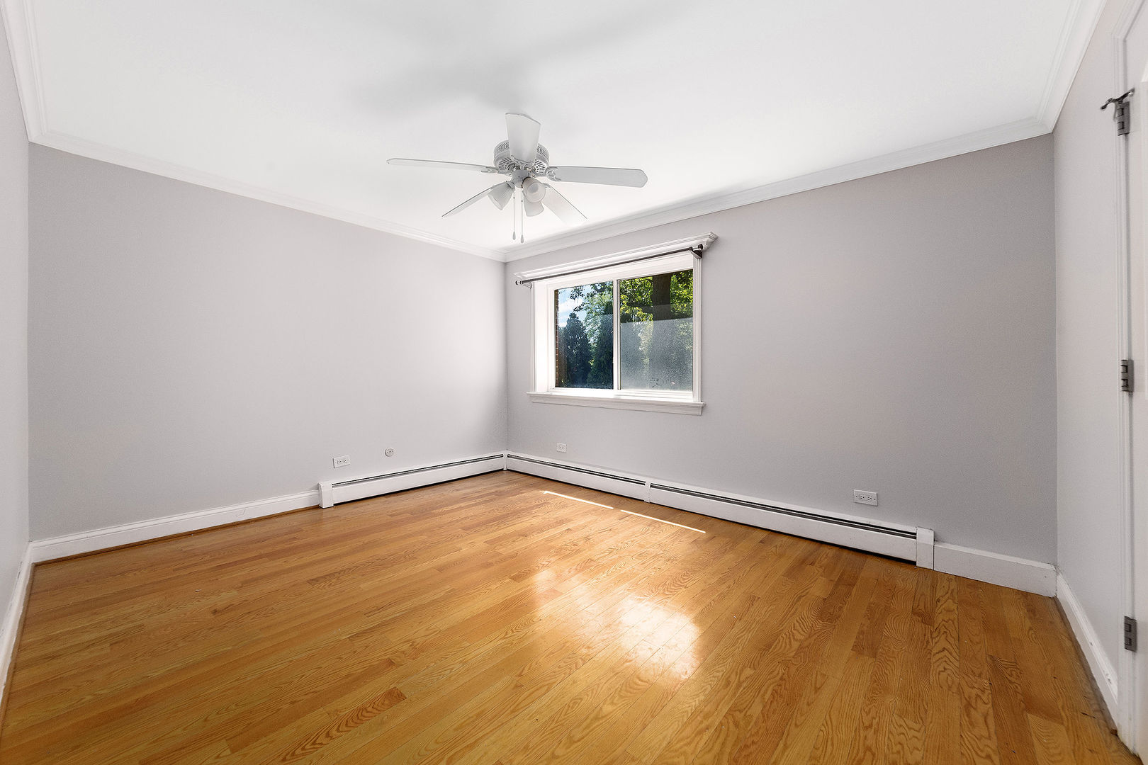 2210 South Goebbert Road, Unit 134 Arlington Heights, IL 60005 - Photo 8 of 10 an empty room with a empty space and windows