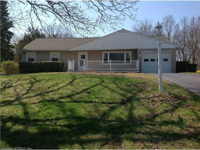 16 Milton Road Waterford, CT 06375 - Photo 1 of 1 a front view of a house with a garden