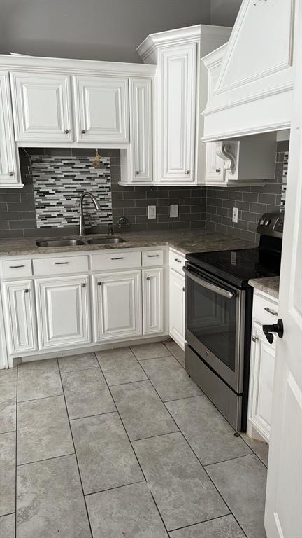 2321 3rd Street Sachse, TX 75048 - Photo 4 of 8 a kitchen with cabinets and appliances