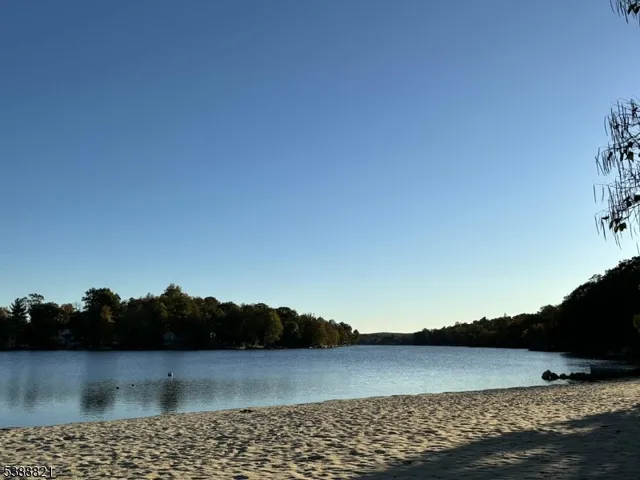 a view of outside space and a lake view