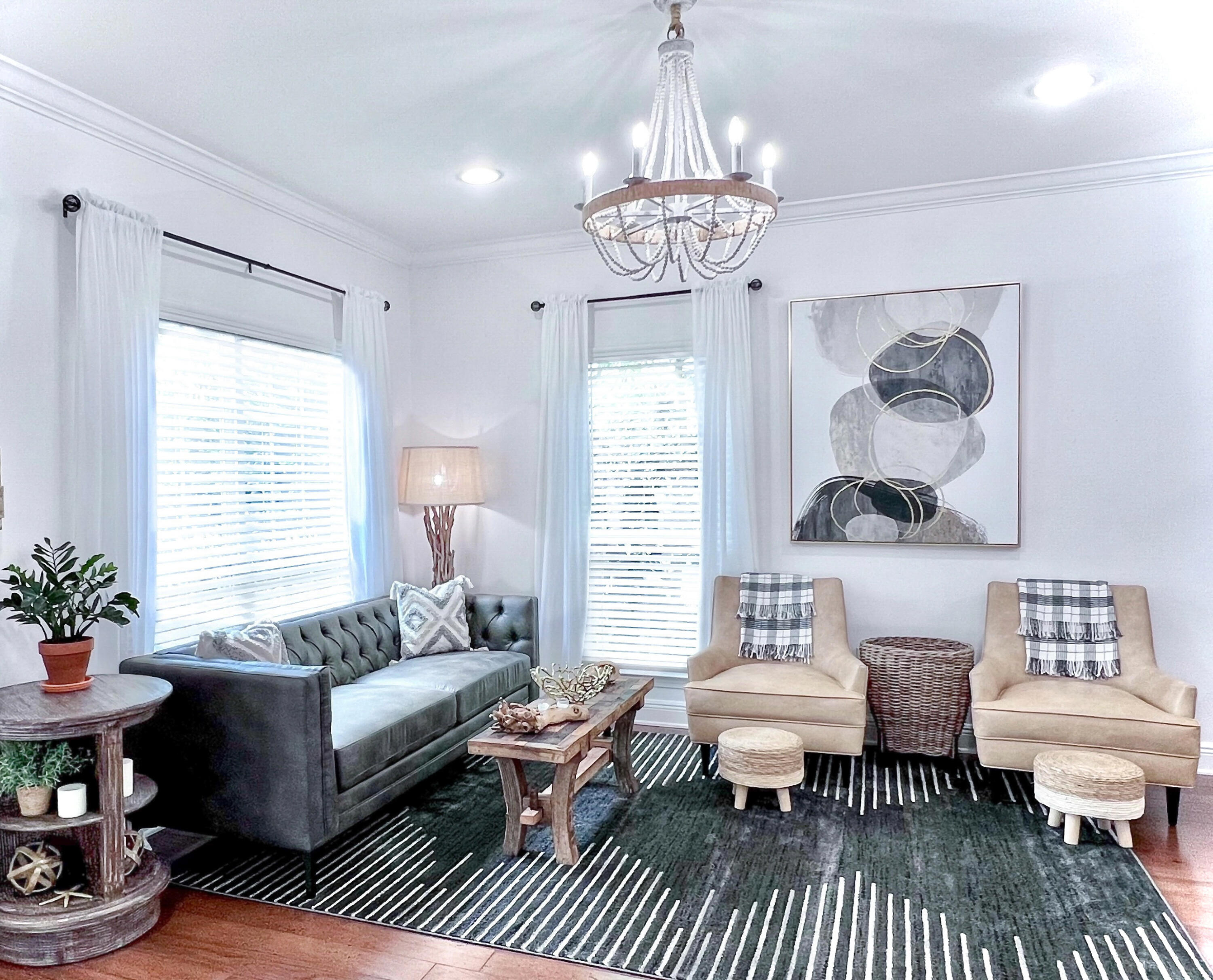 27 Grayling Way Inlet Beach, FL 32461 - Photo 12 of 33 a living room with furniture a chandelier and a window