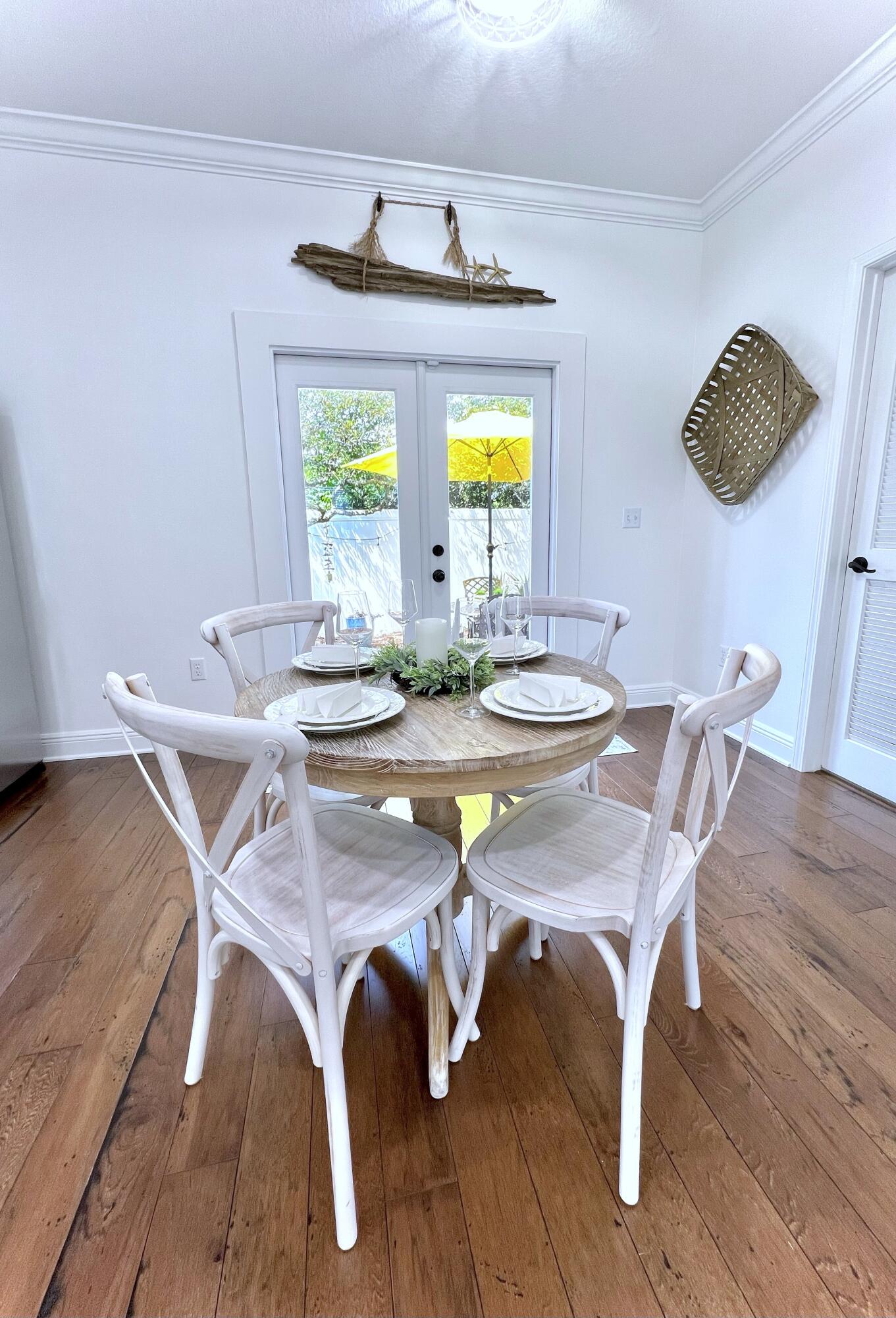 27 Grayling Way Inlet Beach, FL 32461 - Photo 15 of 33 a dining room with furniture and wooden floor