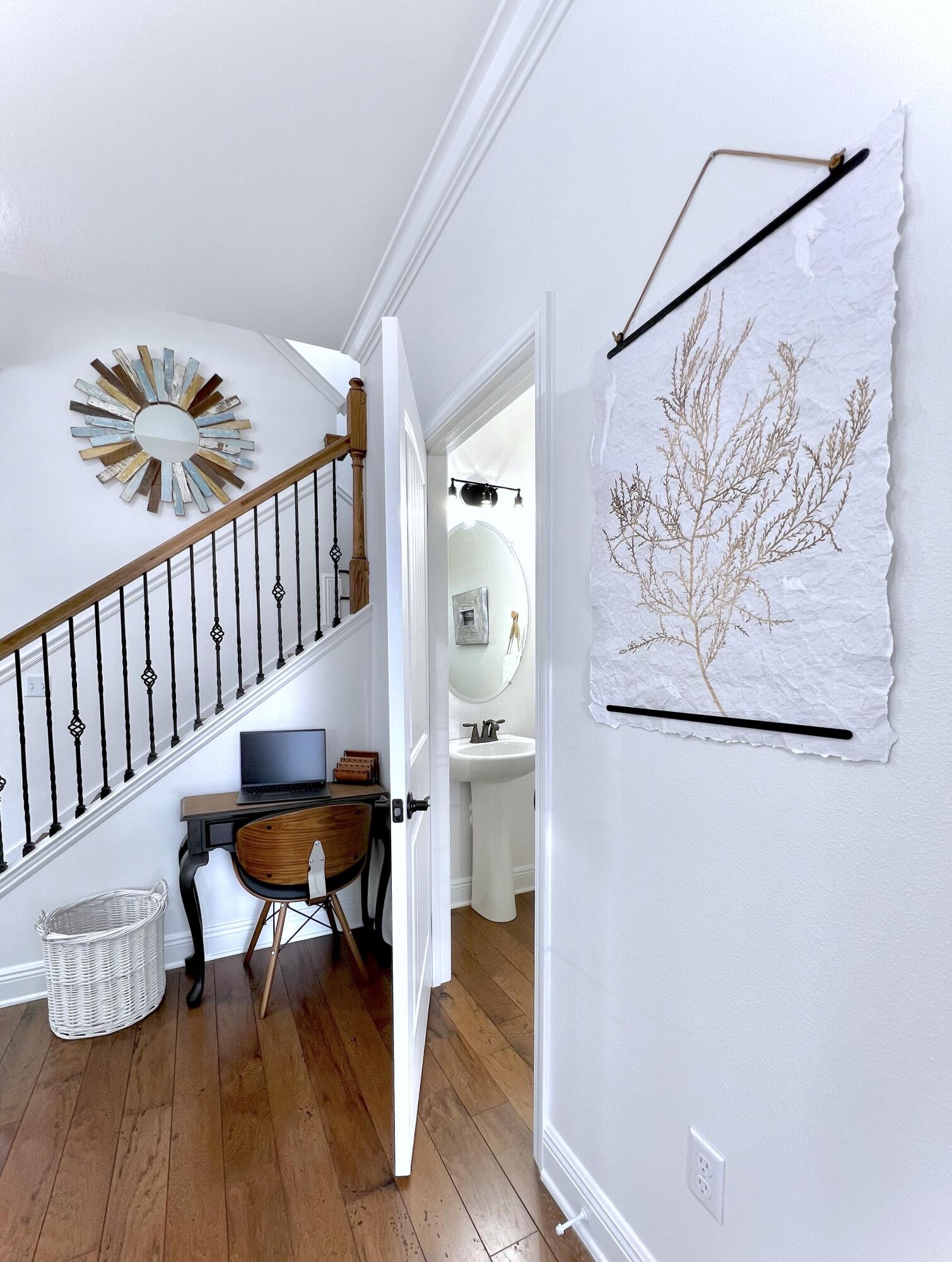 27 Grayling Way Inlet Beach, FL 32461 - Photo 18 of 33 a view of a hallway with wooden floor and a dining table