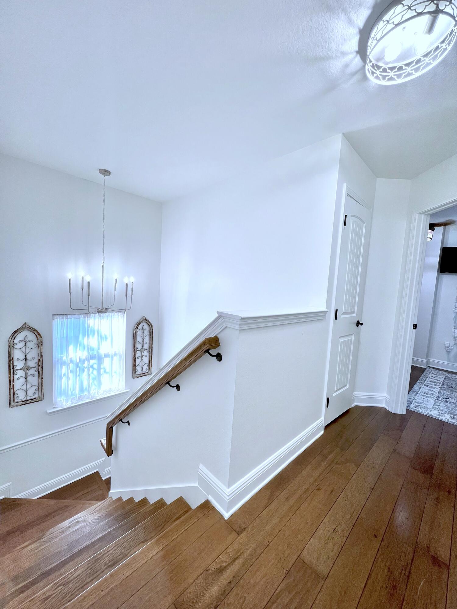 27 Grayling Way Inlet Beach, FL 32461 - Photo 19 of 33 a view of empty room with window and wooden floor