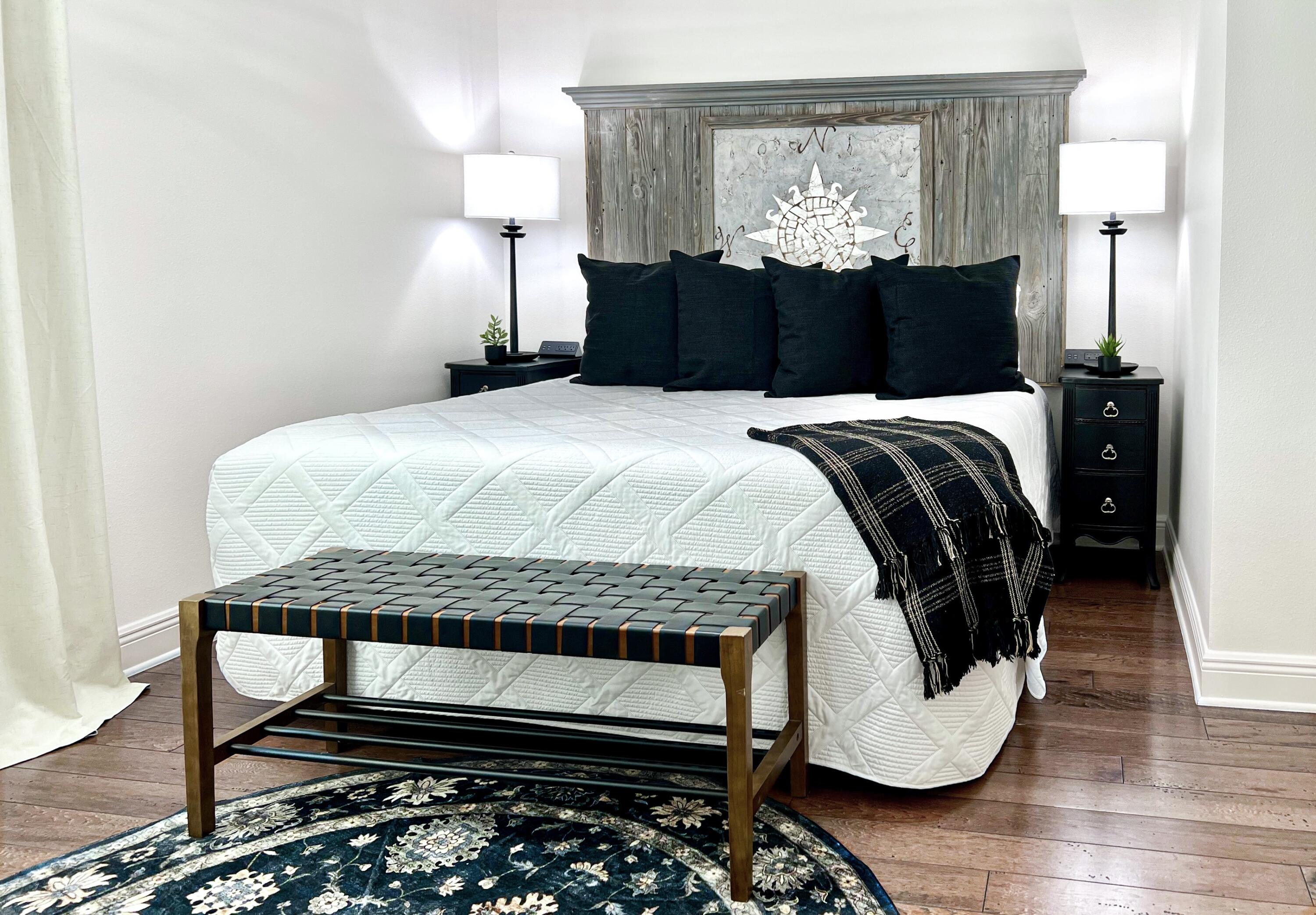 27 Grayling Way Inlet Beach, FL 32461 - Photo 22 of 33 a bedroom with a bed and wooden floor