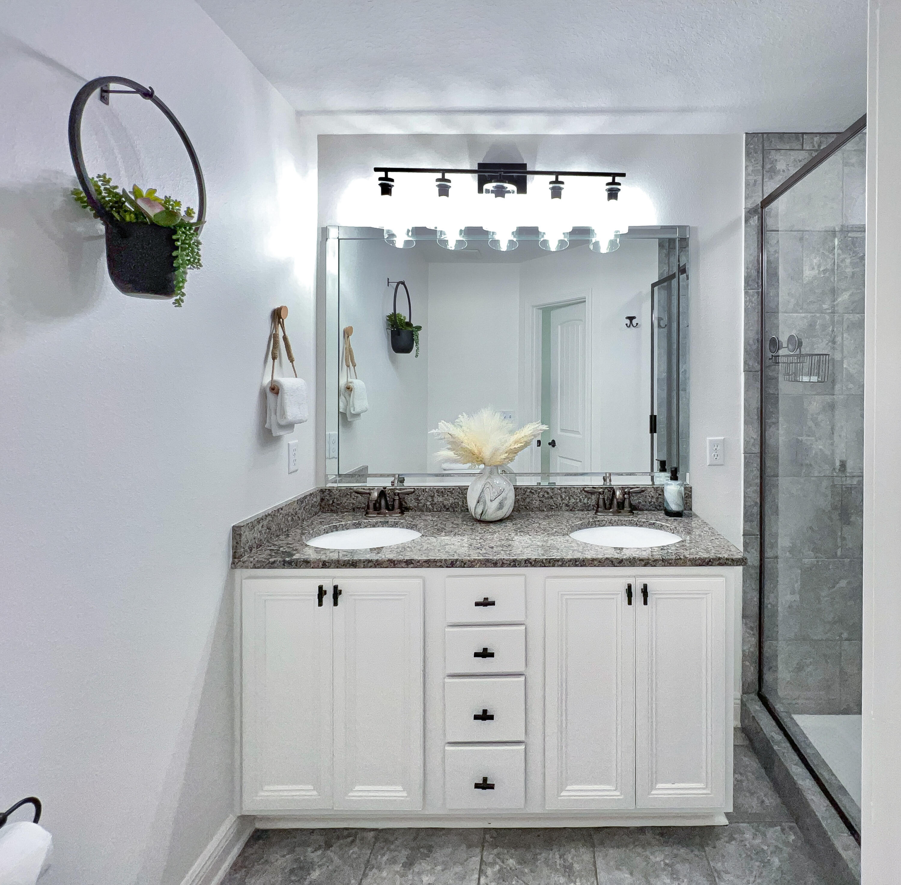 27 Grayling Way Inlet Beach, FL 32461 - Photo 24 of 33 a bathroom with a sink mirror and vanity