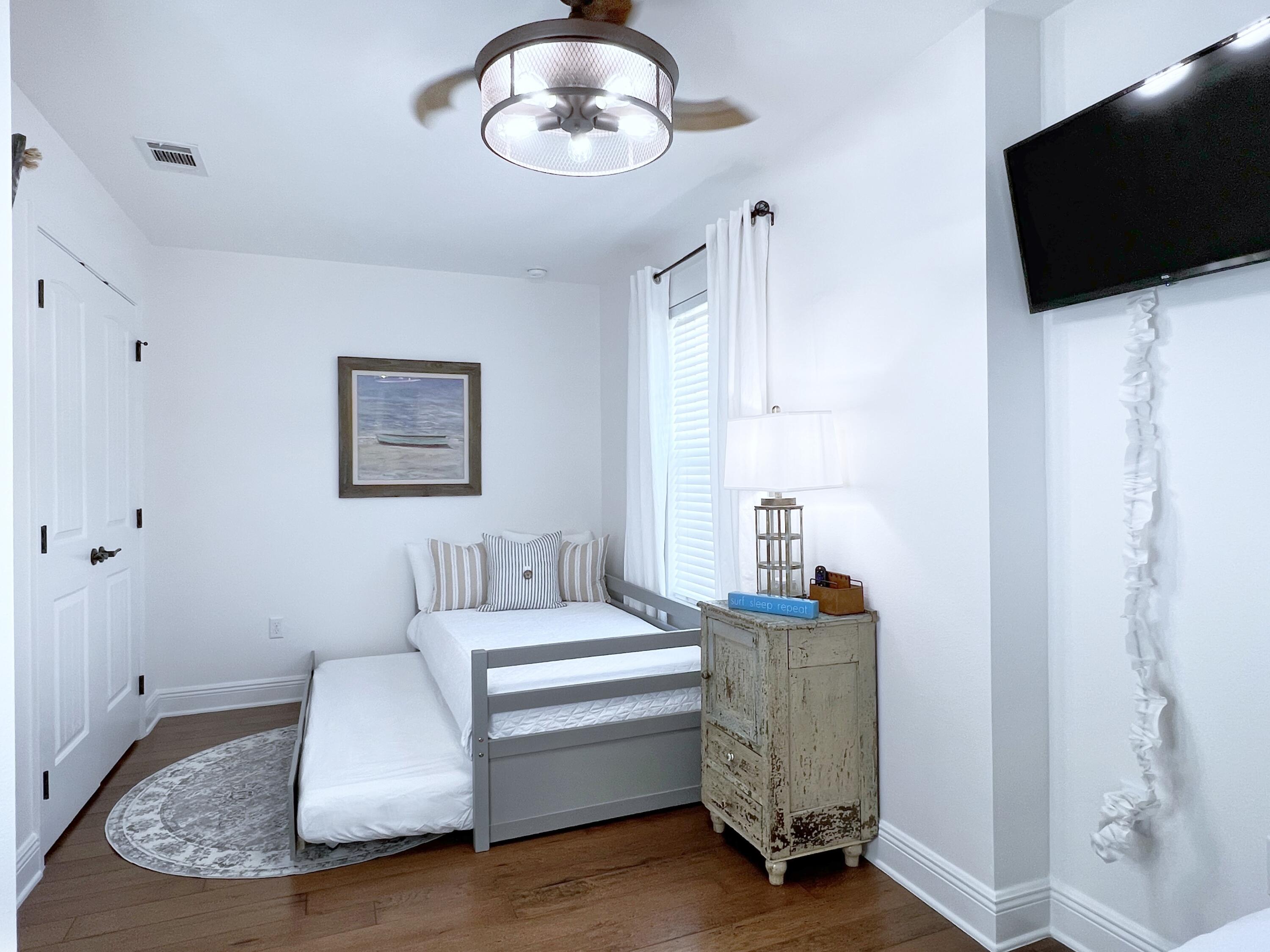 27 Grayling Way Inlet Beach, FL 32461 - Photo 26 of 33 a living room with furniture and a flat screen tv