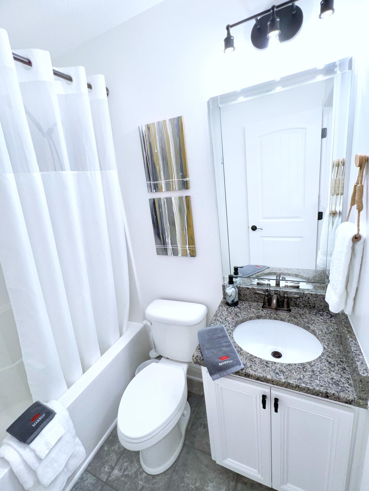 27 Grayling Way Inlet Beach, FL 32461 - Photo 29 of 33 a bathroom with a granite countertop sink toilet and shower