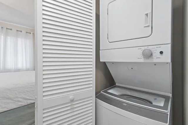 a utility room with washer and dryer