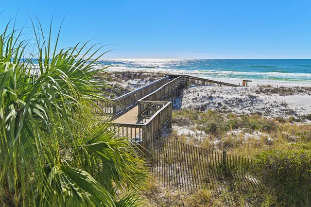 a view of a terrace with wooden floor and bench