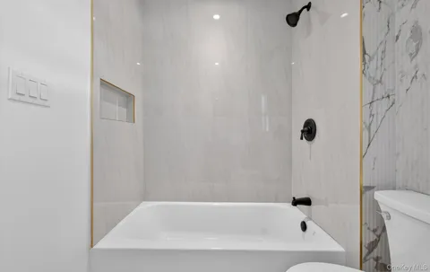 a bathroom with a bathtub