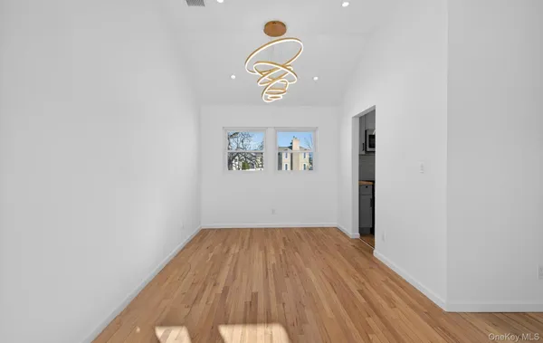 a view of a workspace with furniture