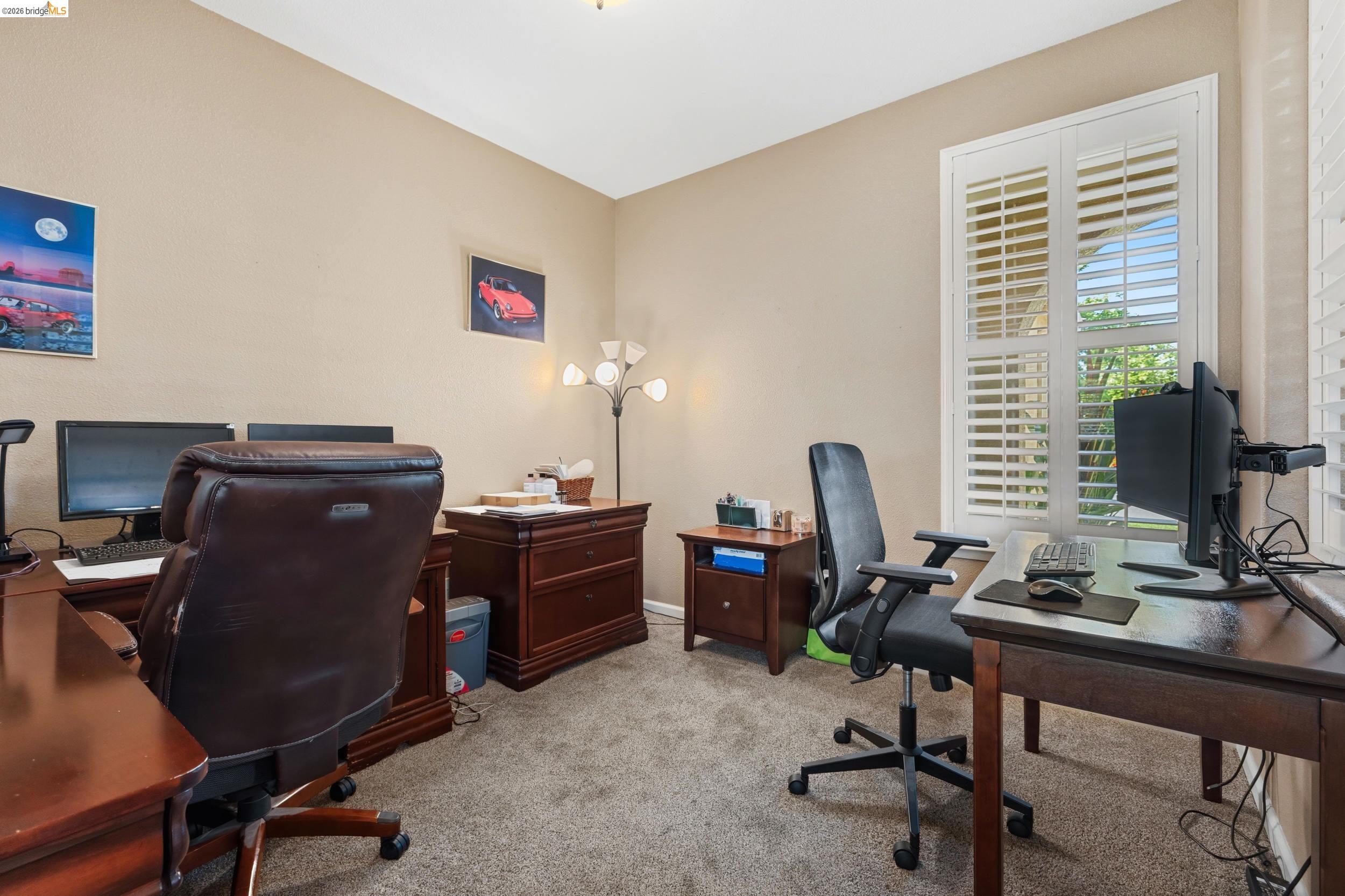 1063 Waterwood Drive Rio Vista, CA 94571 - Photo 20 of 38 a view of a workspace with furniture and a window