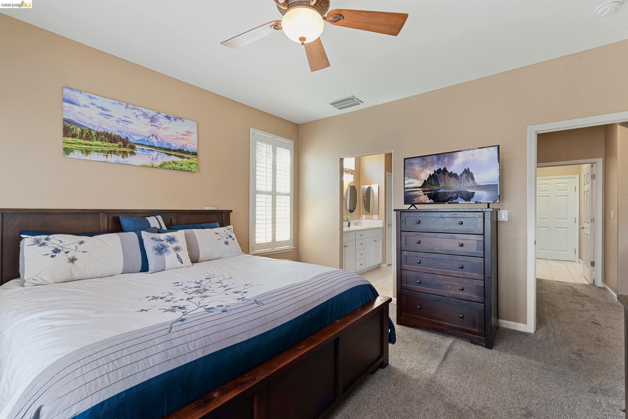 1063 Waterwood Drive Rio Vista, CA 94571 - Photo 24 of 38 a bedroom with a bed and dresser