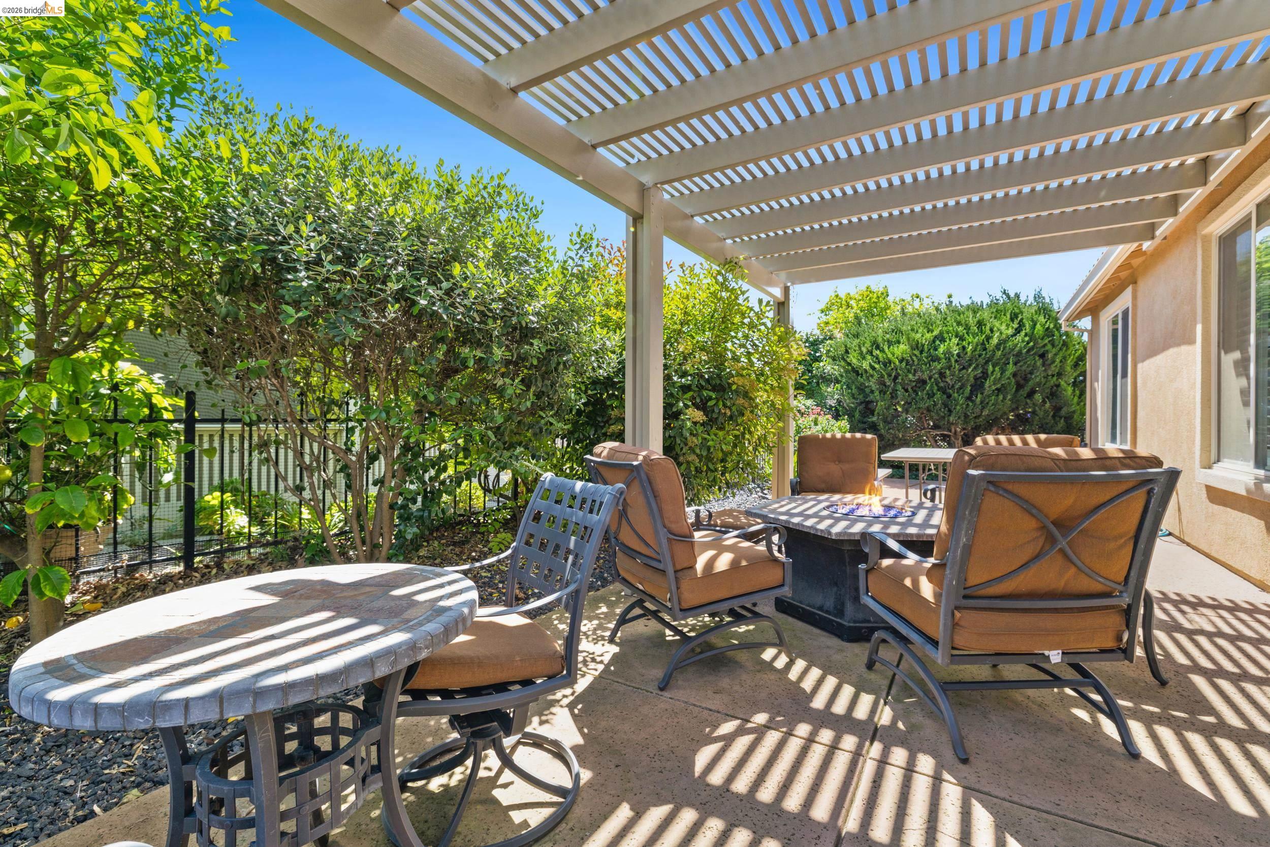 1063 Waterwood Drive Rio Vista, CA 94571 - Photo 30 of 38 a view of a patio with table and chairs and wooden floor