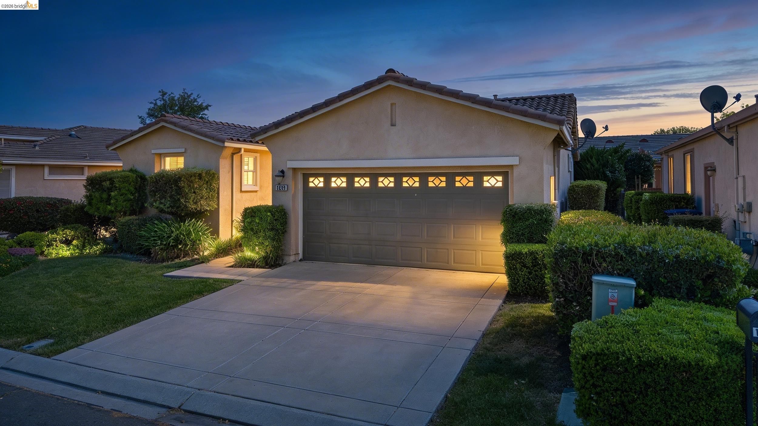 1063 Waterwood Drive Rio Vista, CA 94571 - Photo 3 of 38 a front view of a house with garden